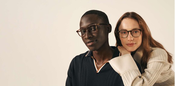 Two people wearing glasses