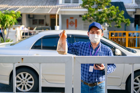 Food delivery driver in Asia.