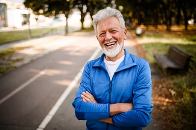 Smiling person outdoors_GettyImages-1031050432