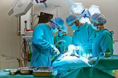 Team of surgeons performing operation