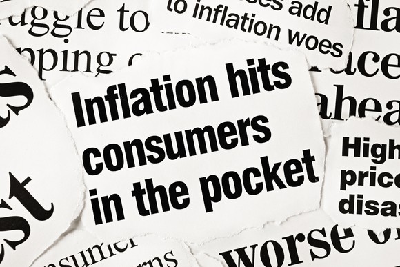 Newspaper headlines about inflation.