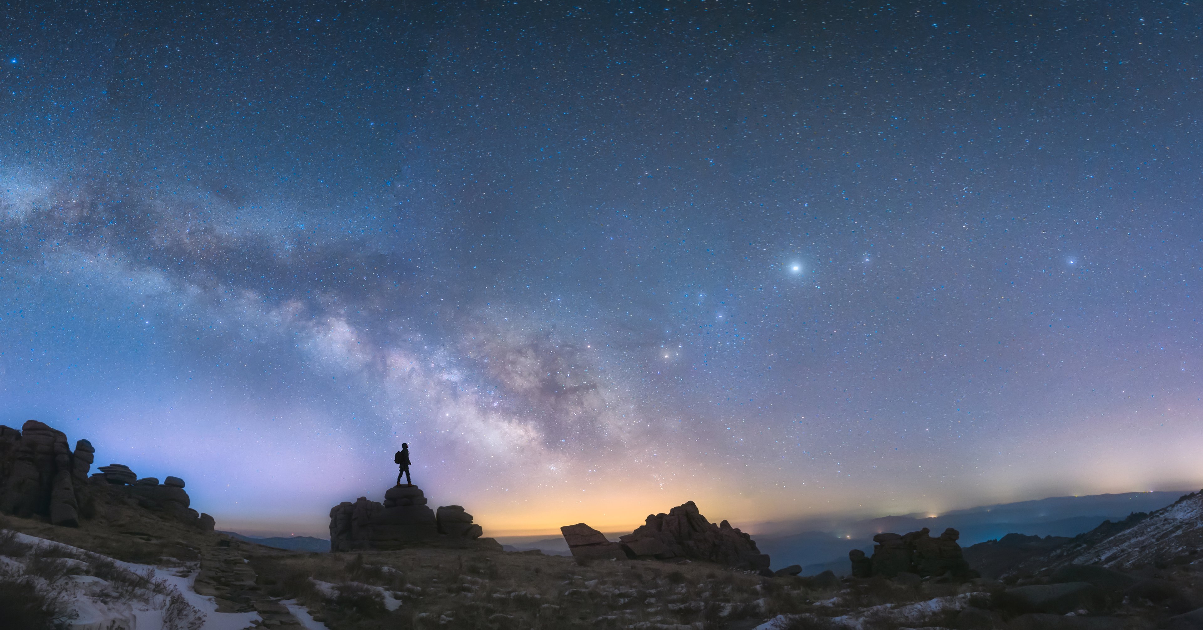 Glancing at the Milky Way while atop a shoreline. 