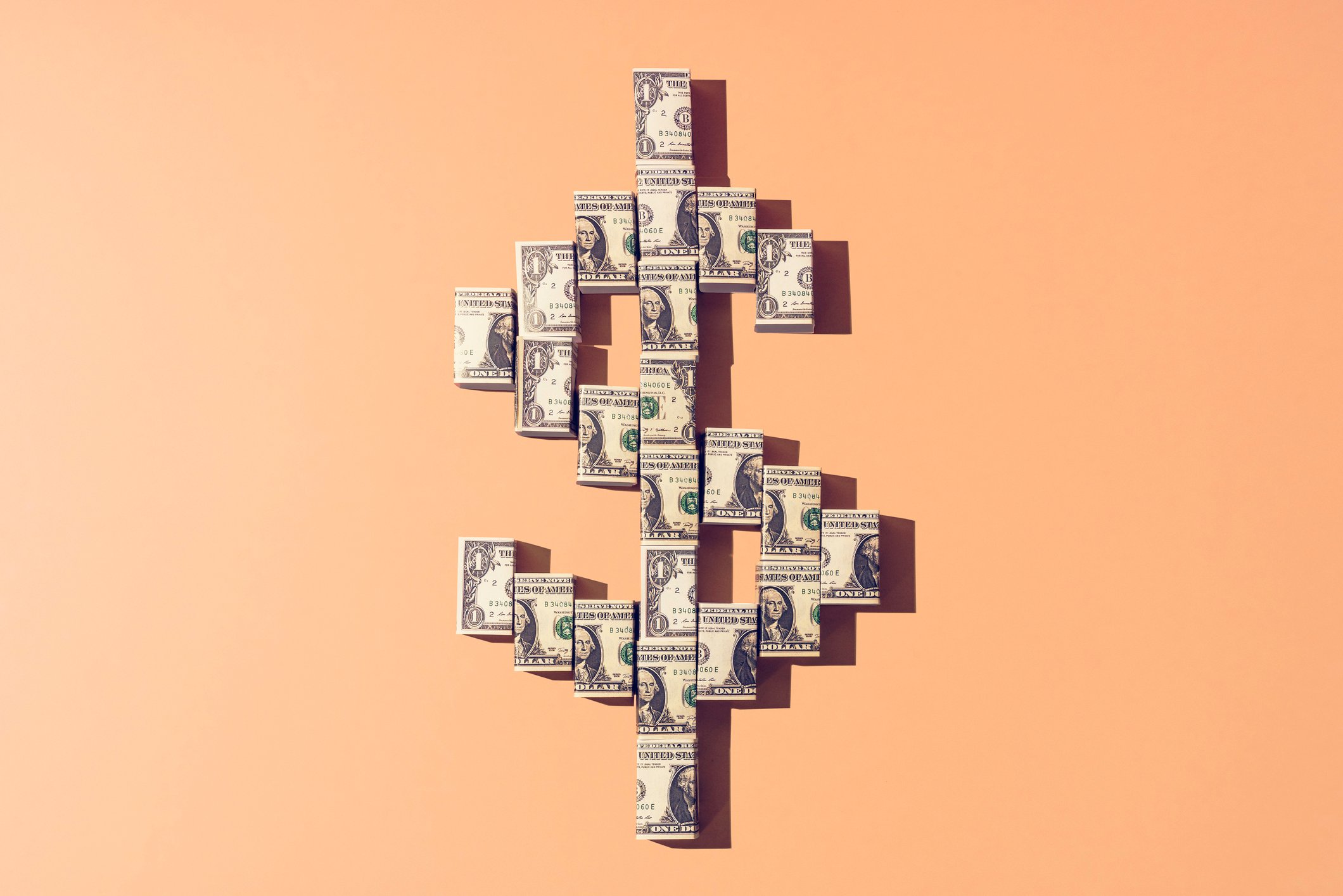 A dollar sign made of dollar bills. 