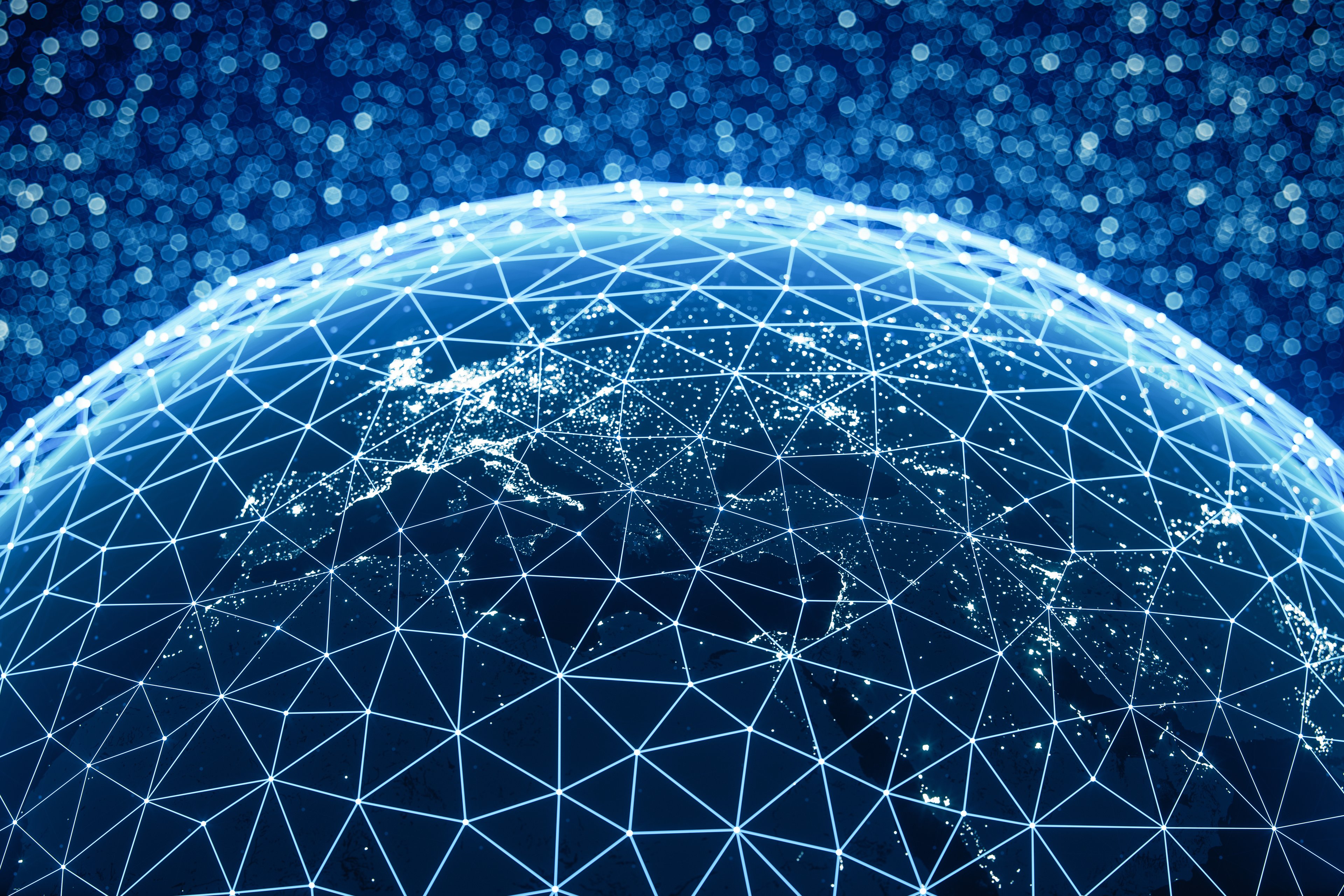 World at night with city lights and abstract connections.