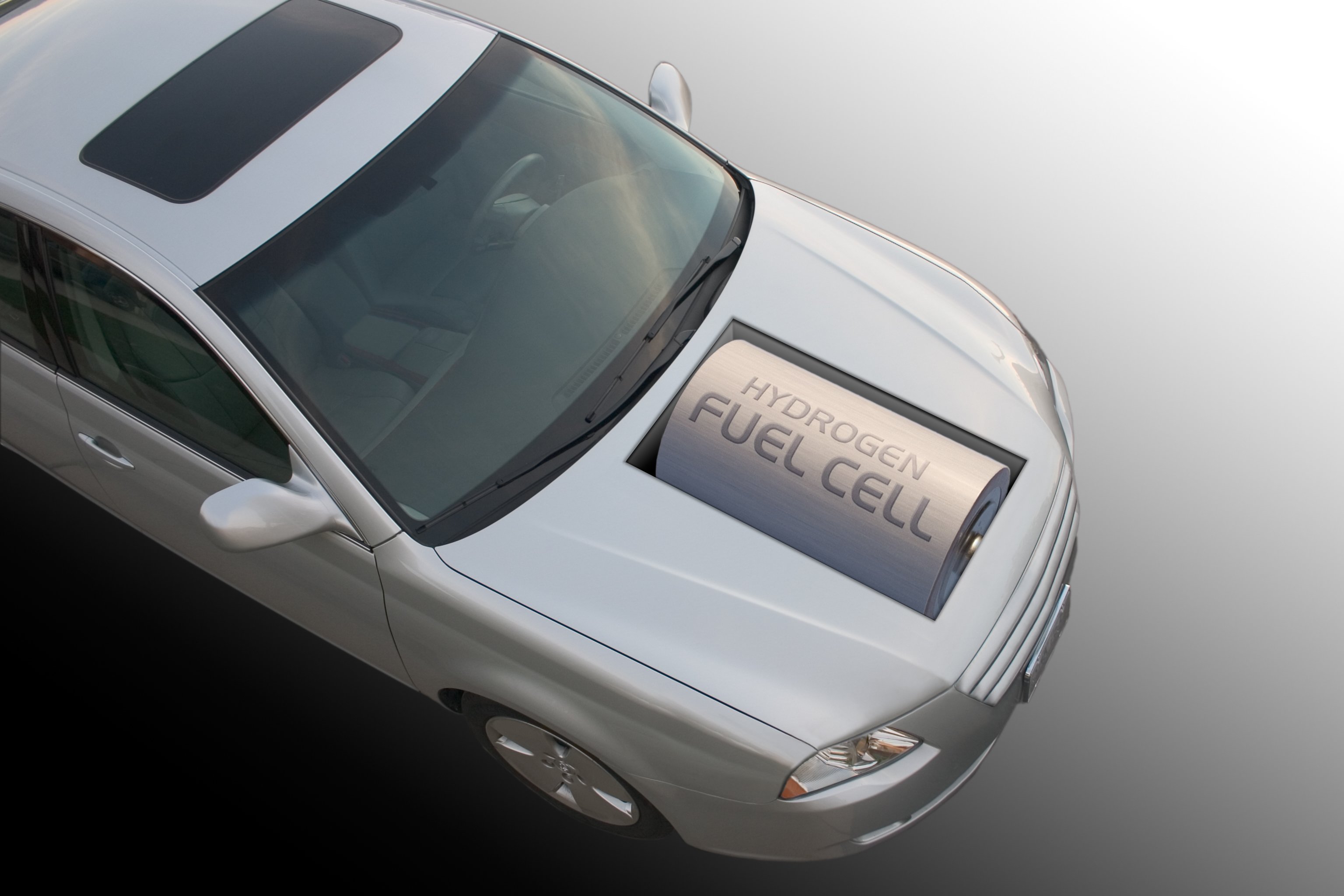 An automobile with a large battery in its hood that says "hydrogen fuel cell."