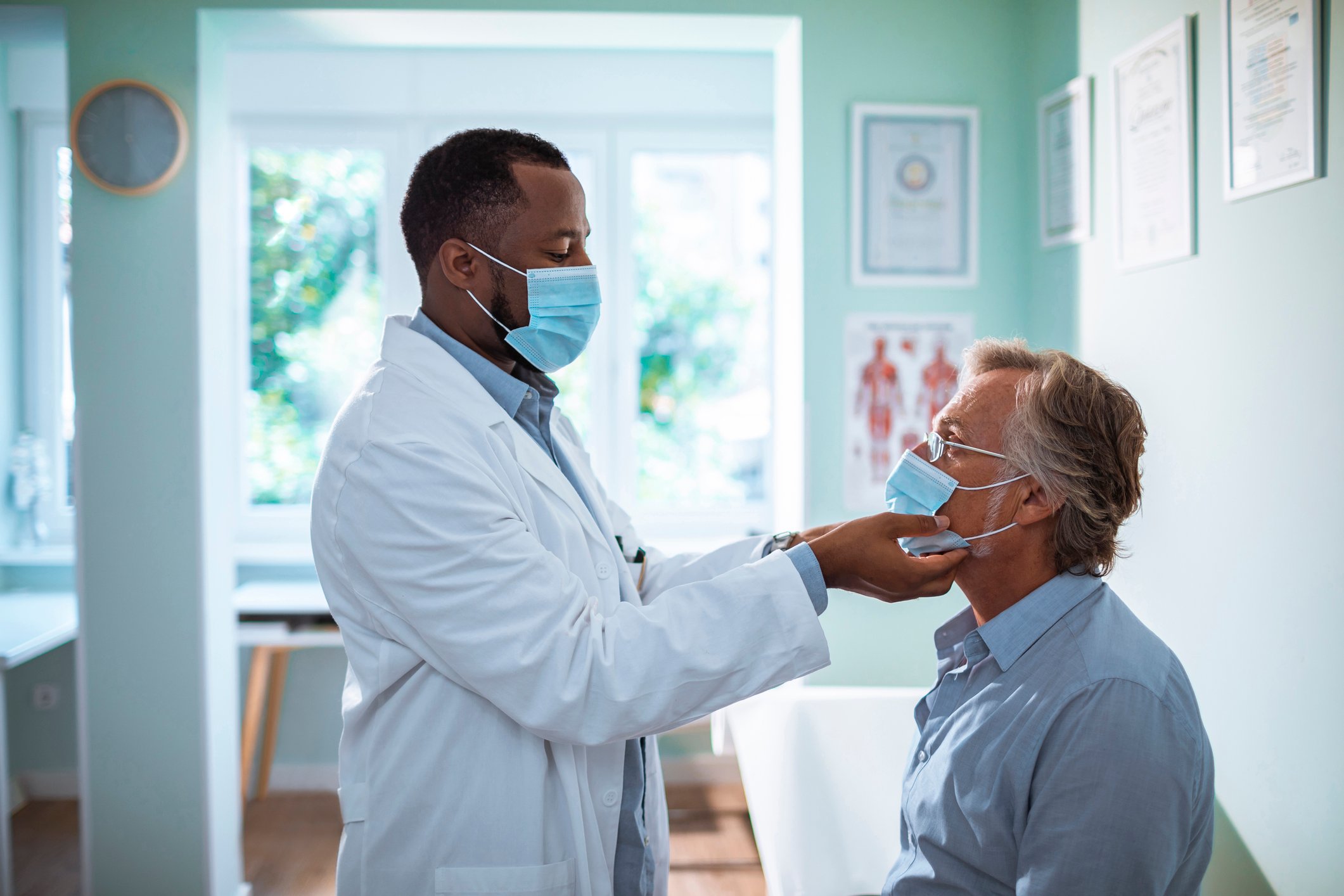 A doctor performs a physical exam on a patient.