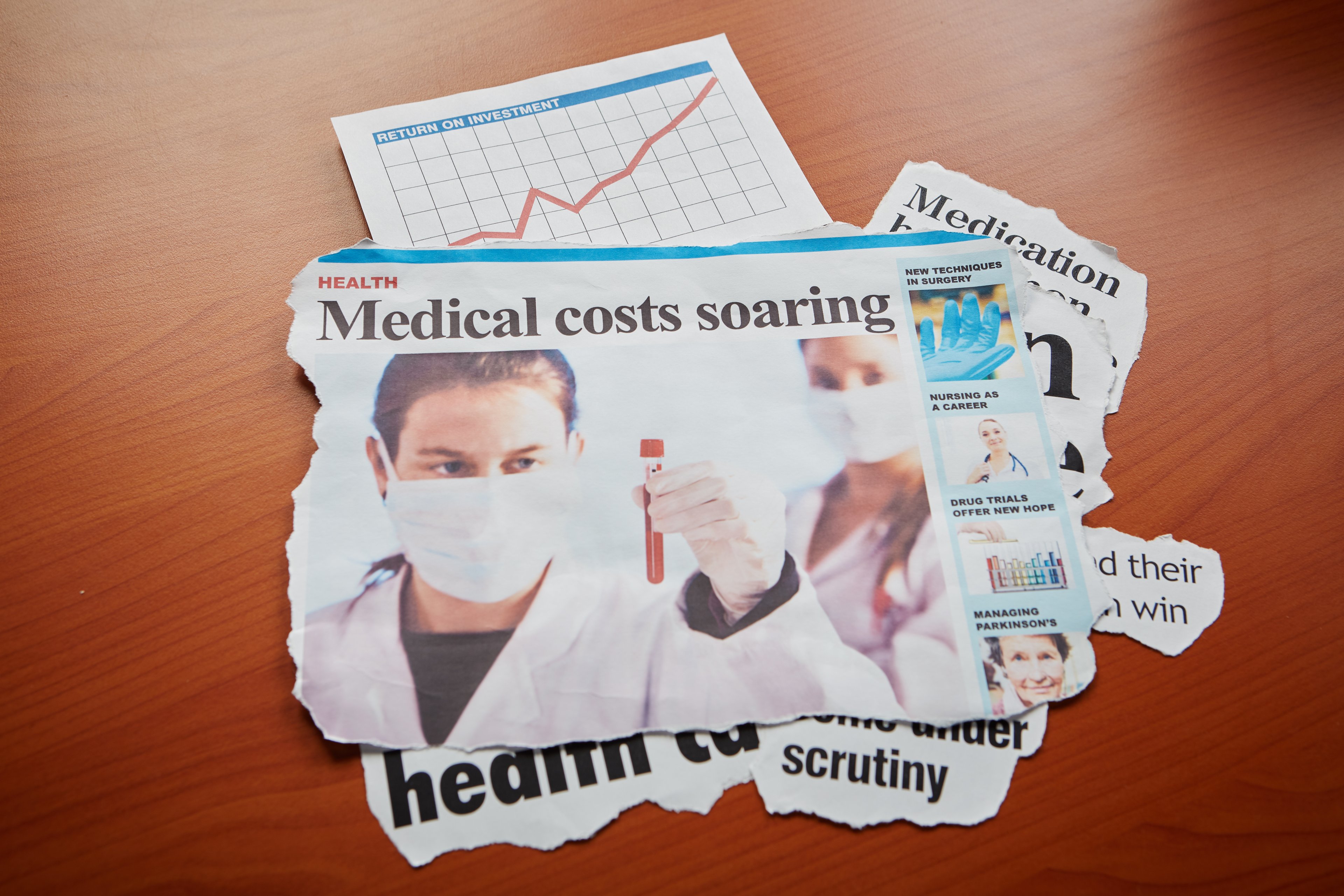 A newspaper clipping with the headline "Medical costs soaring."