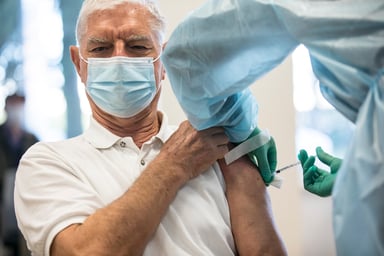 senior man gets vaccinated