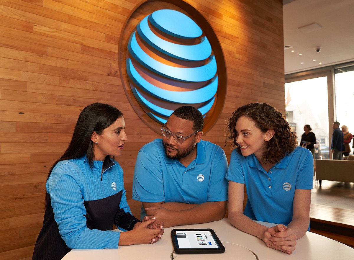 A sales team of three works at an AT&T store