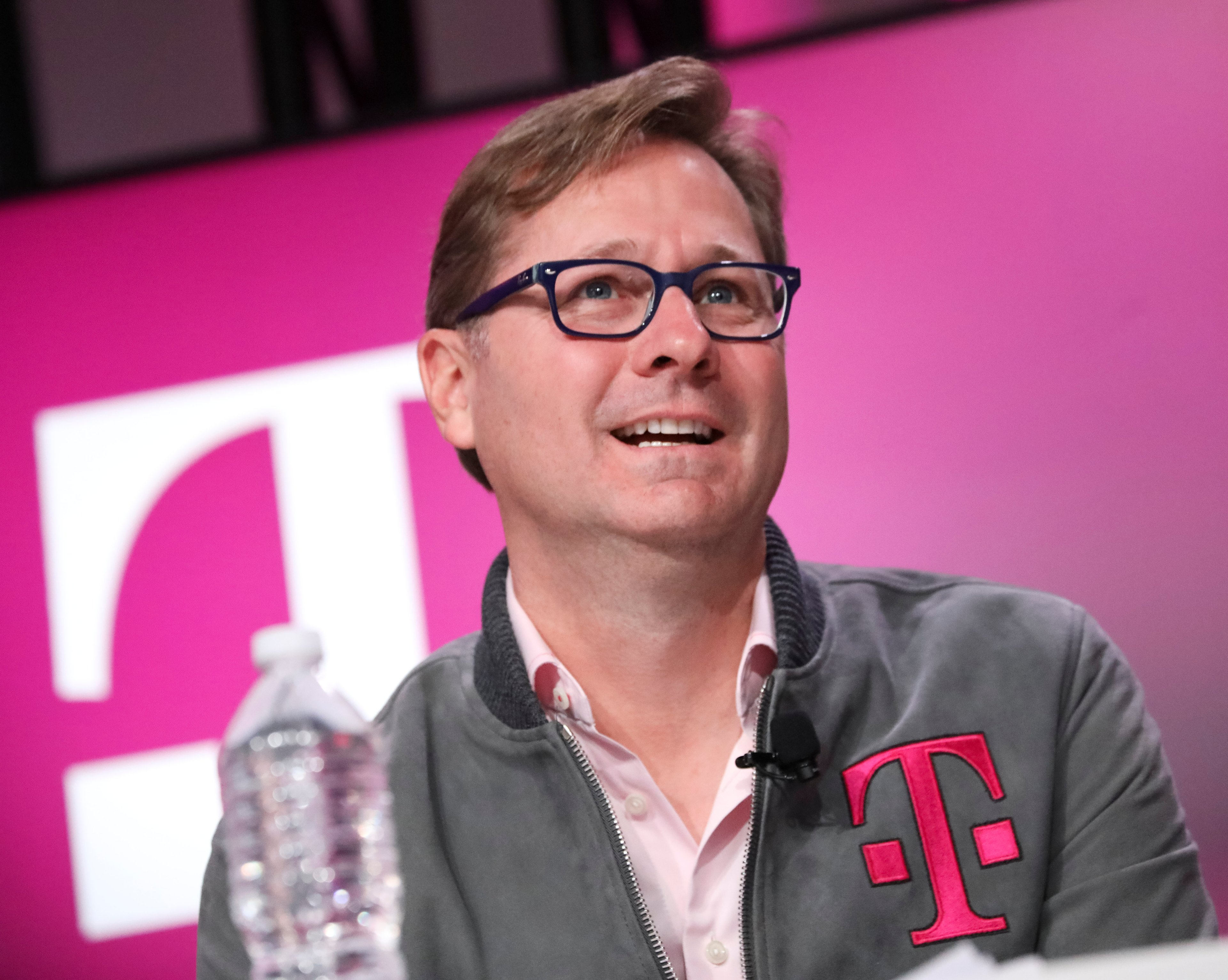 T-Mobile's CEO Mike Sievert in a T-Mobile jacket.
