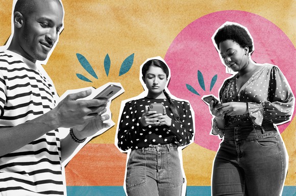 Man and two women looking at their smartphones.