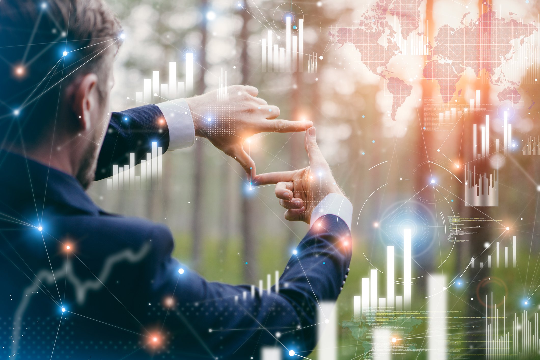 Person reviewing financial charts on a virtual display.