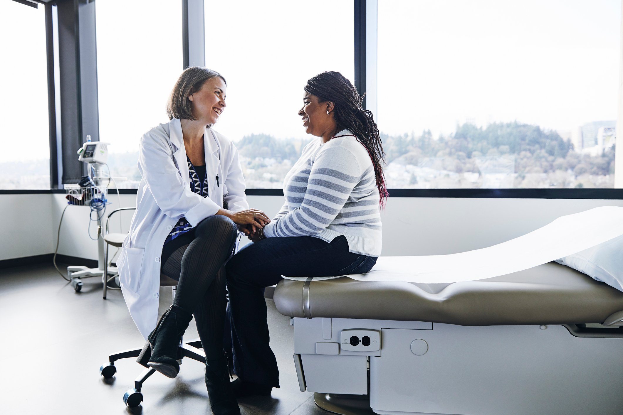 Smiling doctor and patient. 