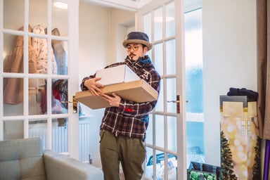 Shopper holding boxes