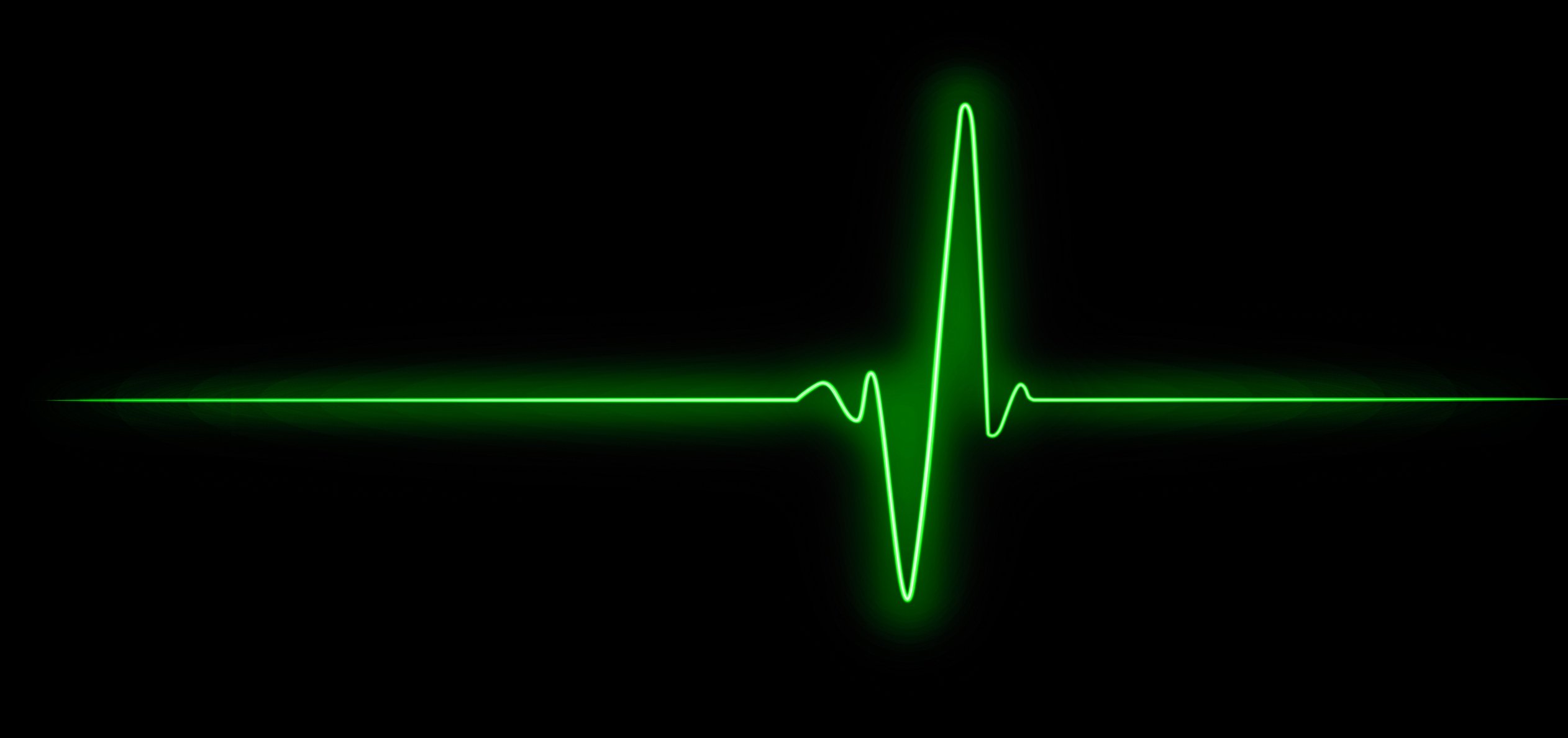 A green line of a heart monitor shows a rhythm.