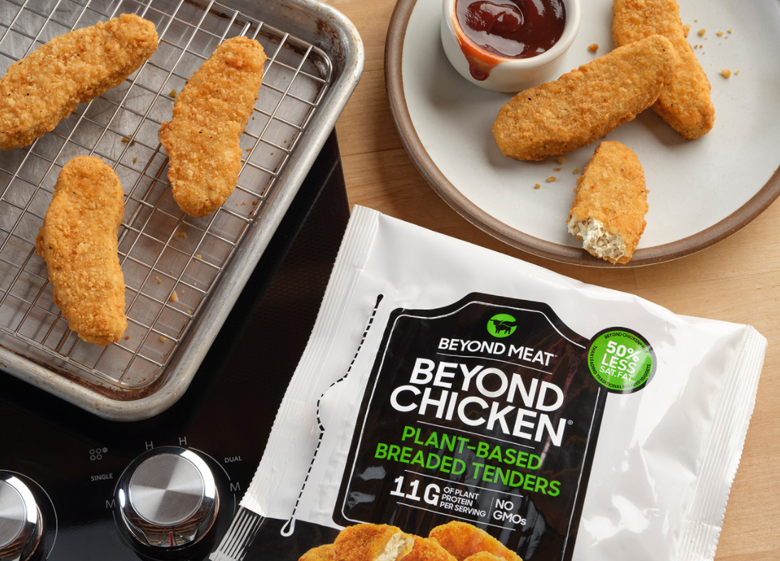 A bag of Beyond Chicken tenders, with tenders on a plate and a pan.
