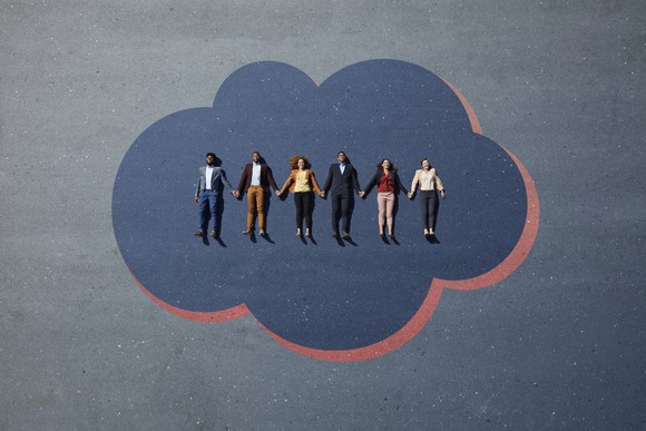 Six people lying on a cloud.