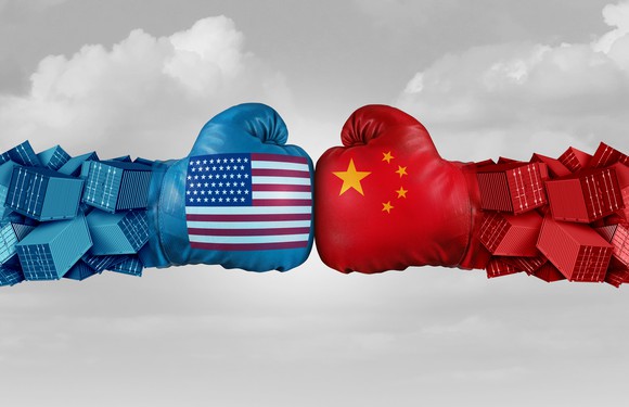 Boxing gloves with U.S. and China flags.
