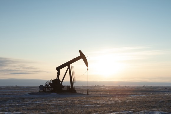 Drilling rig in an open field. 
