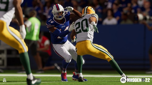 Two virtual football players in action in EA's Madden NFL football game.