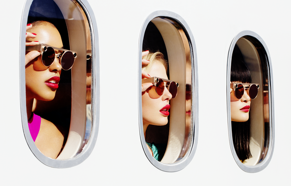 People wearing Snap Spectacles looking out a window. 