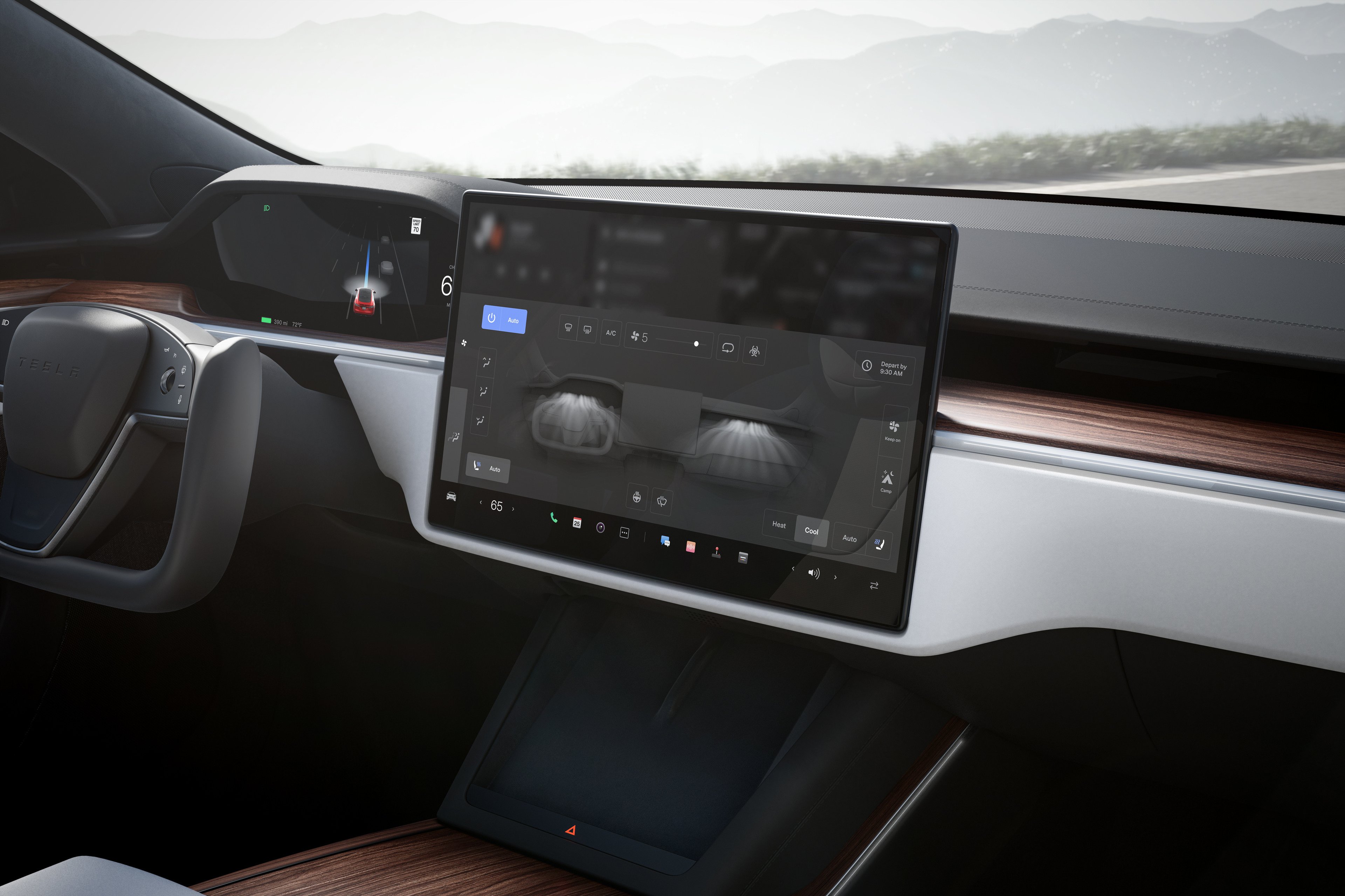 A view of the display panel of a Tesla Model S electric viehicle, as seen from the passenger seat. The dashboard, steering wheel and display panel are all visible.