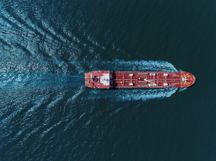 Ship sailing on open water. 