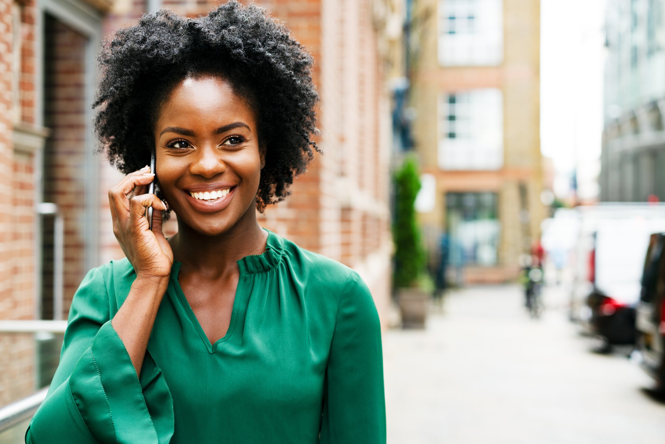Person talking on their smartphone.