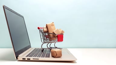 Shopping cart on laptop