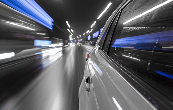 Car speeding on road