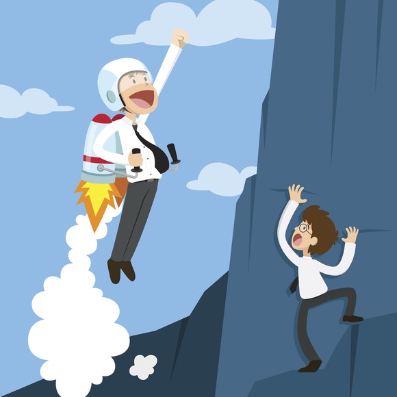 Cartoon businessperson with a jetpack flies past a businessperson climbing a cliff.