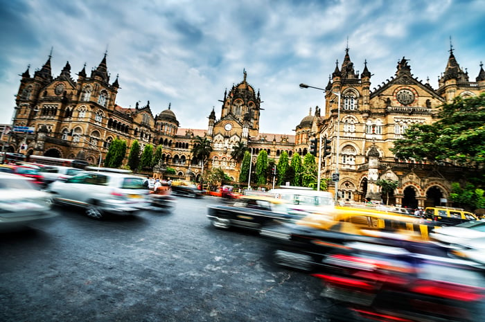 Heavy vehicular traffic in Mumbai, India, outside the Victoria rail station. 