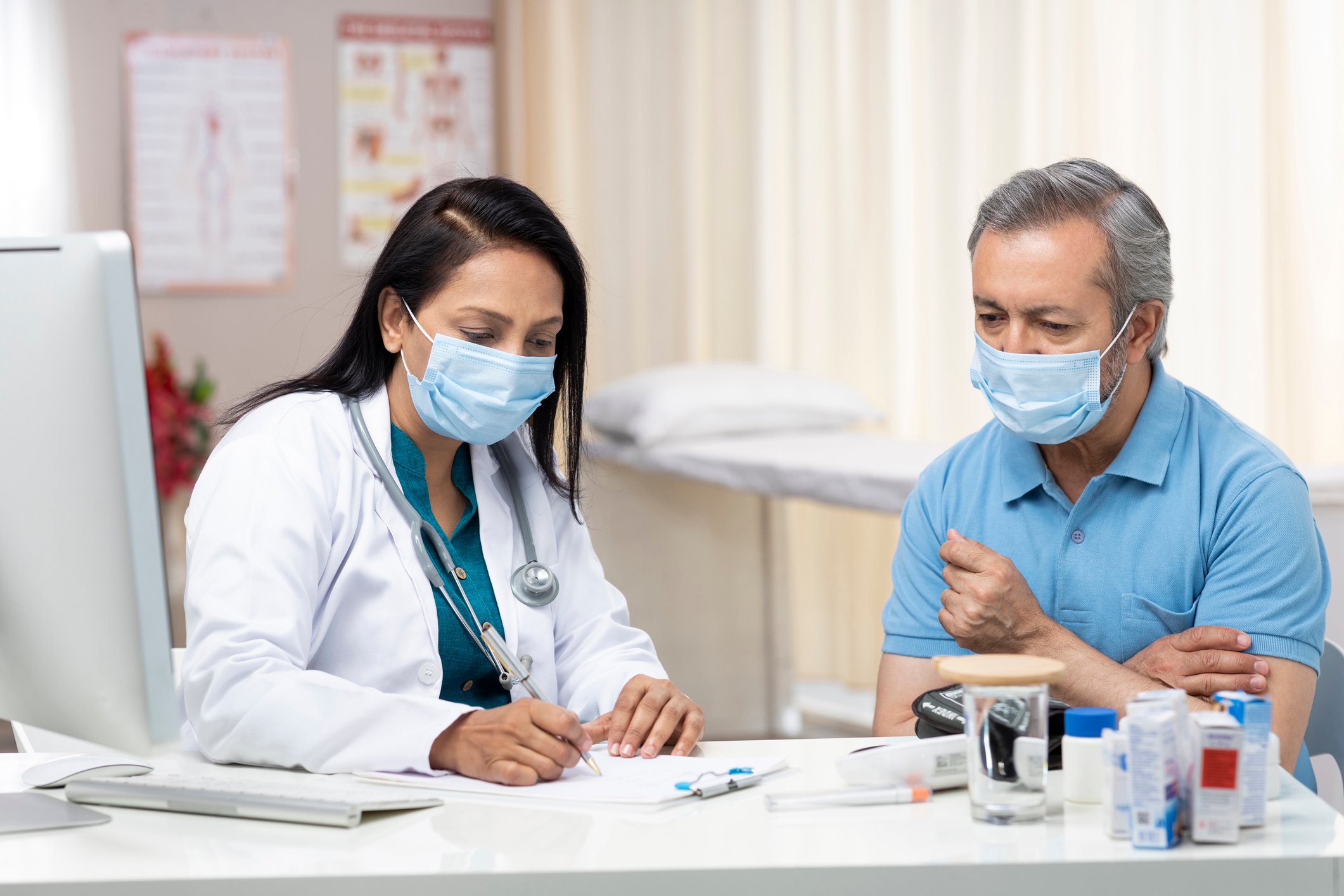 Doctor and patient in office.