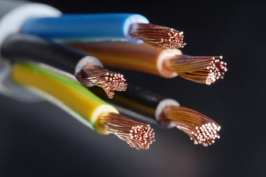 A closeup of copper wiring in electric cables.