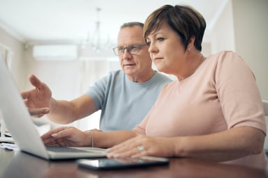 Two people at laptop_GettyImages-1329695567