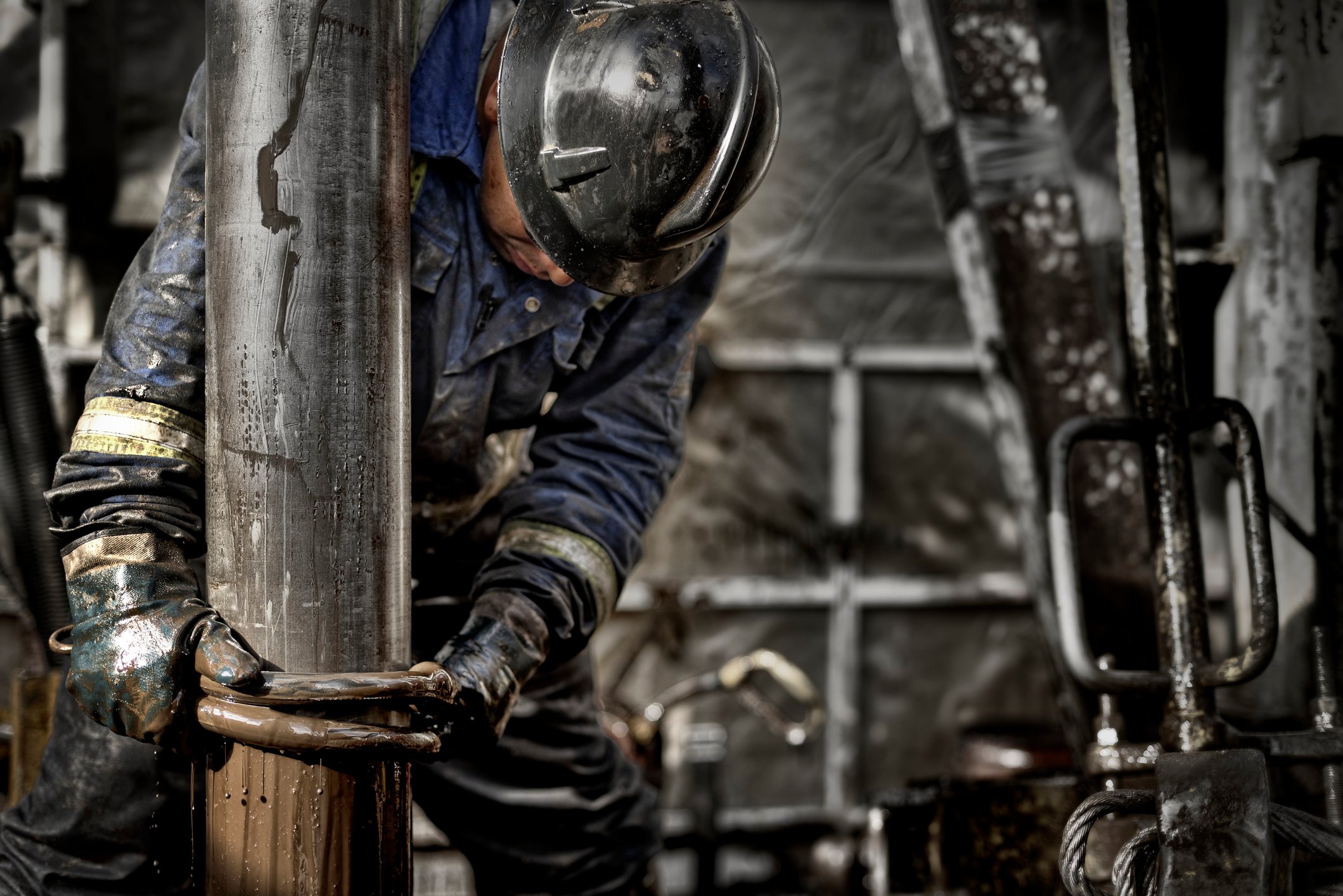 A person working on an oil well.