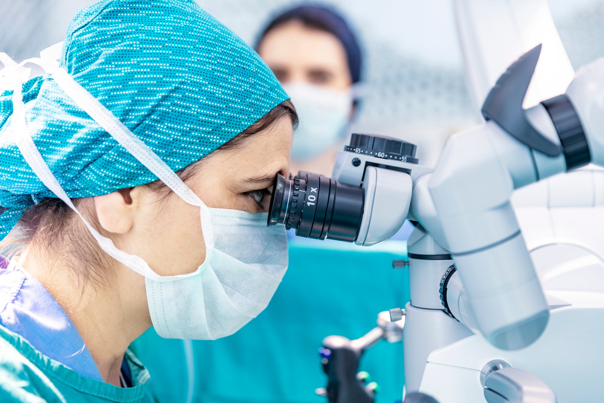 A surgeon uses robotic equipment in a procedure.