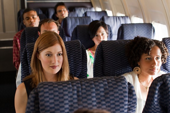 Passengers on an airplane.