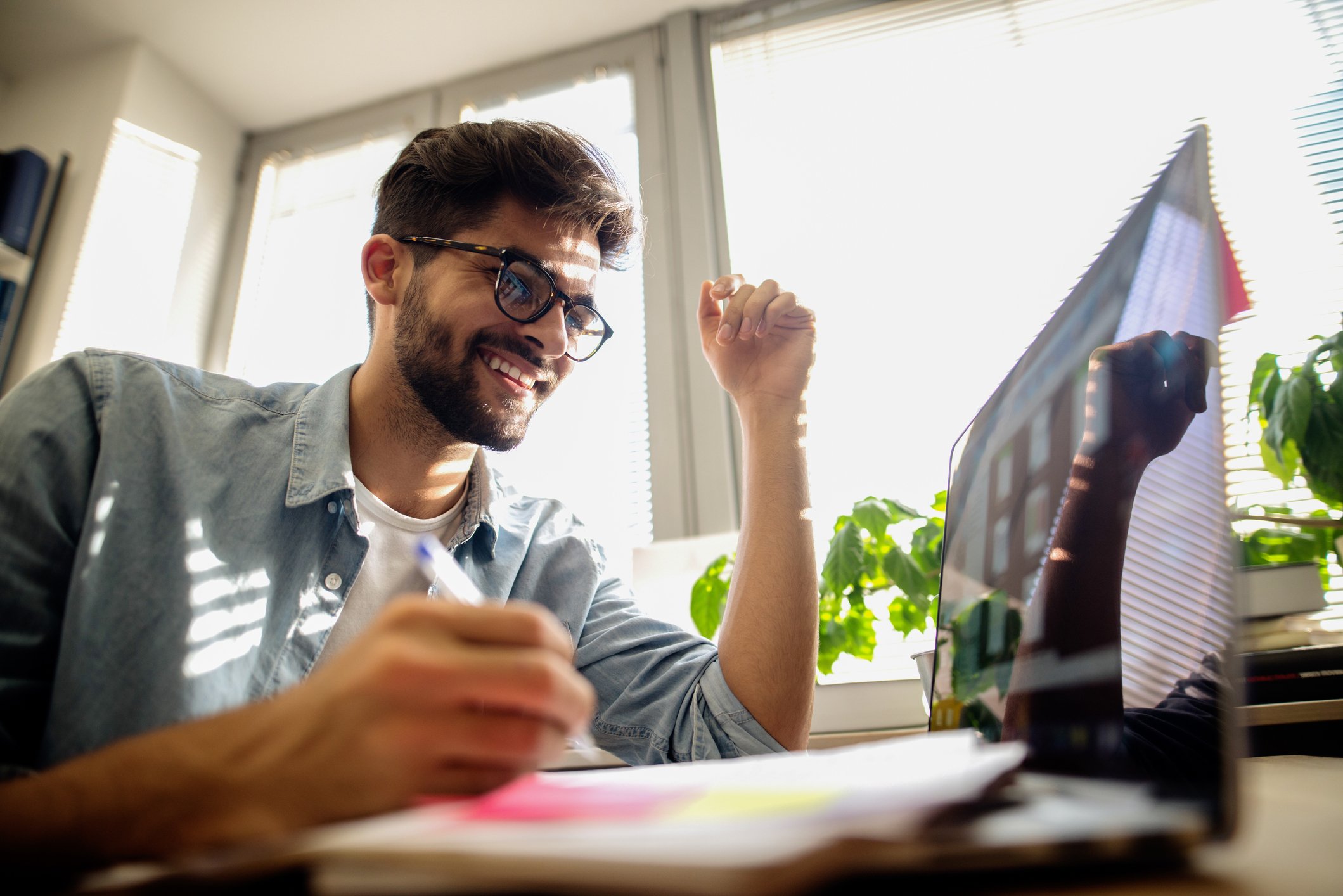 A person doing homework on their laptop.