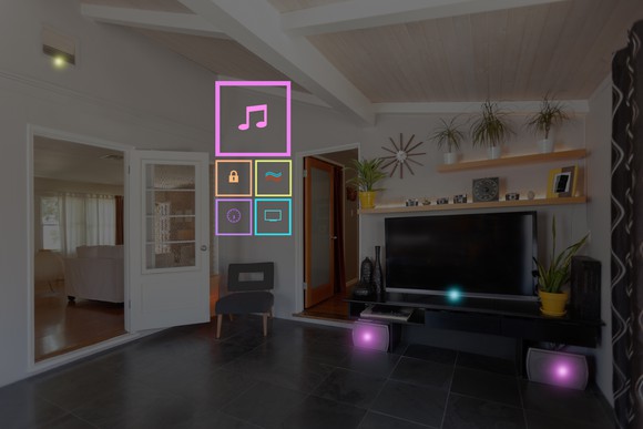 A living room equipped with digital services for security, music, and TV.