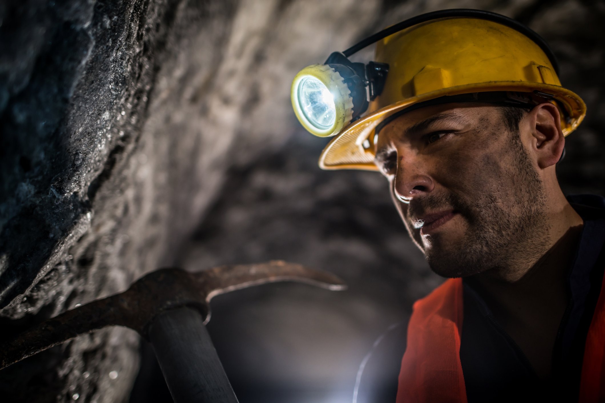 A miner working in a mine.