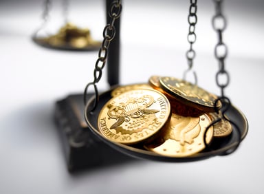 Gold coins on a scale.