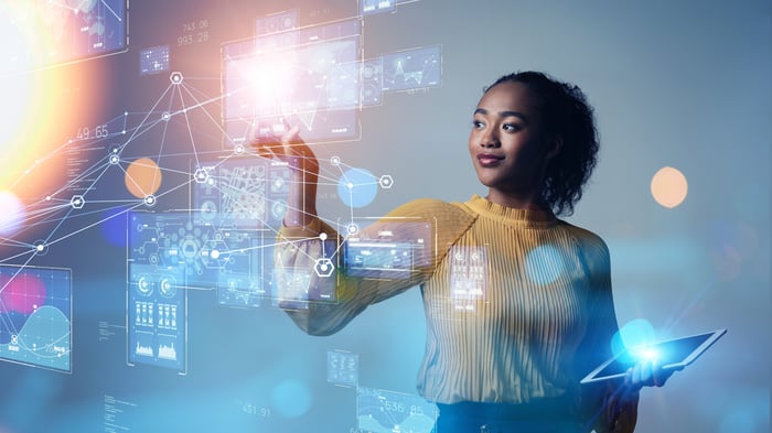 Technology person using a digital interface.
