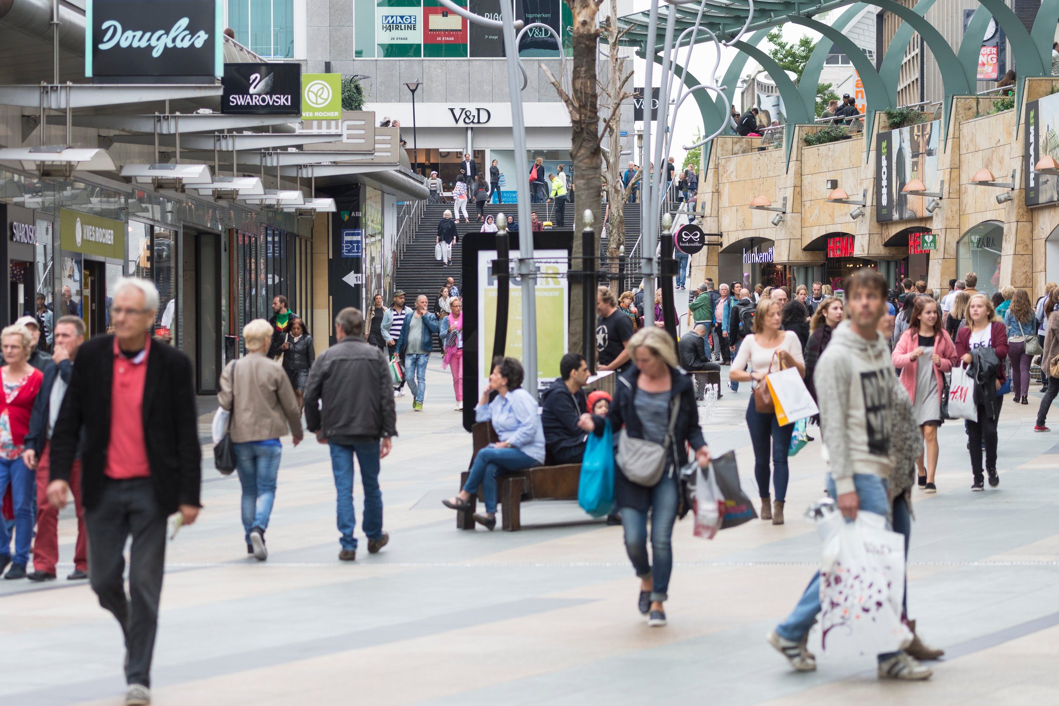 People shopping in a mall.