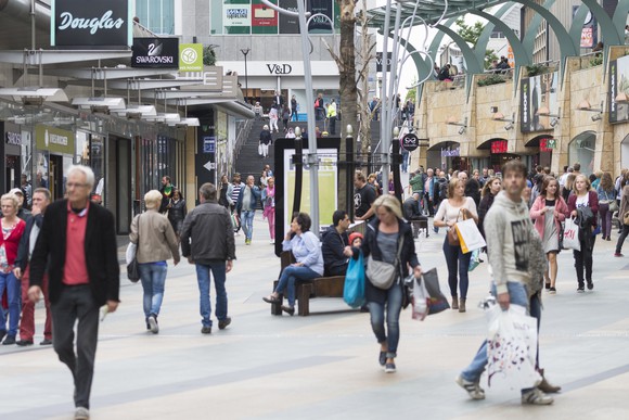 People shopping in a mall.