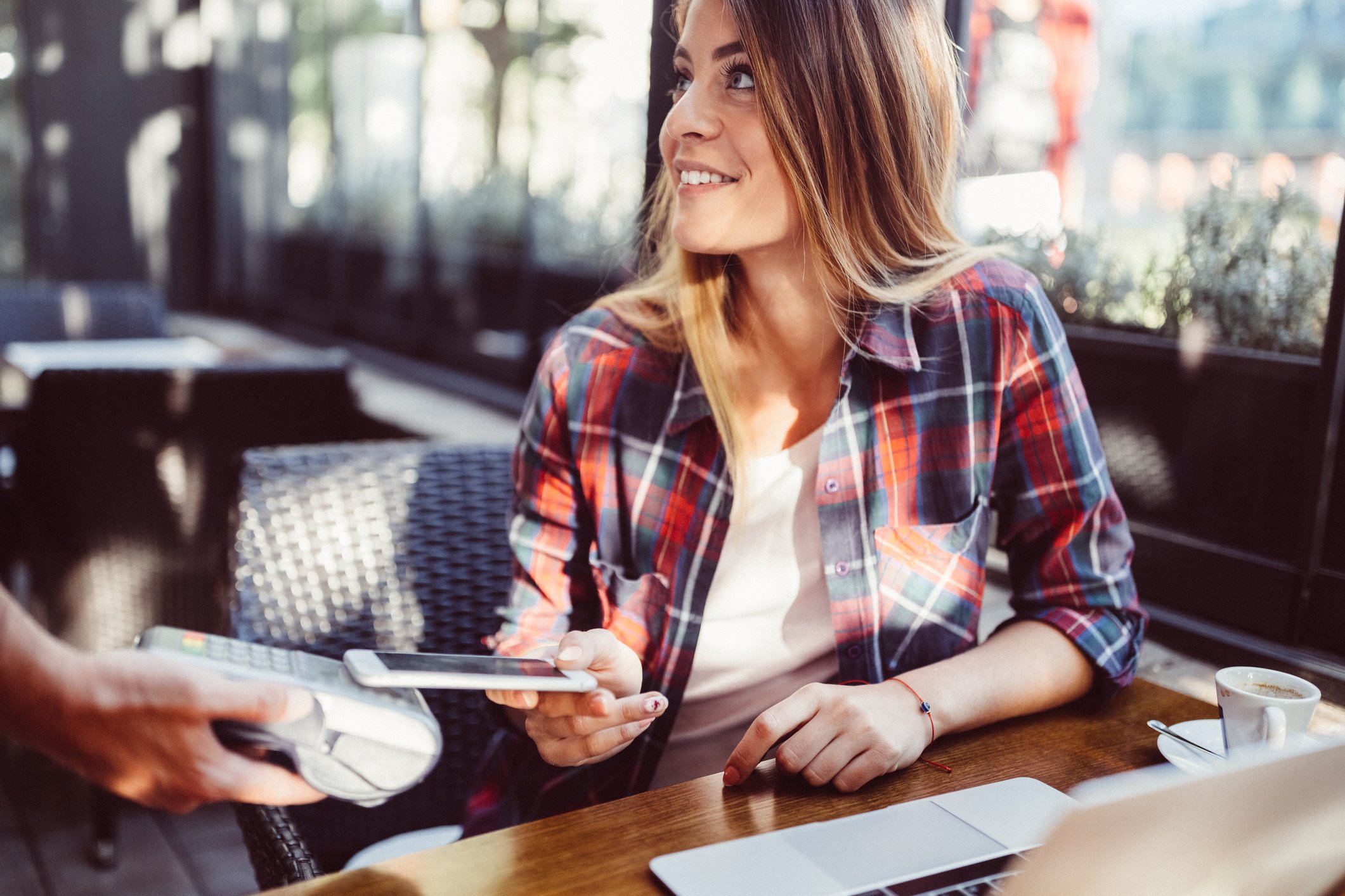 Using a smartphone to make an in-store payment.