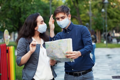 Travelers fighting over a map