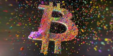 Bitcoin symbol made up of colored spheres