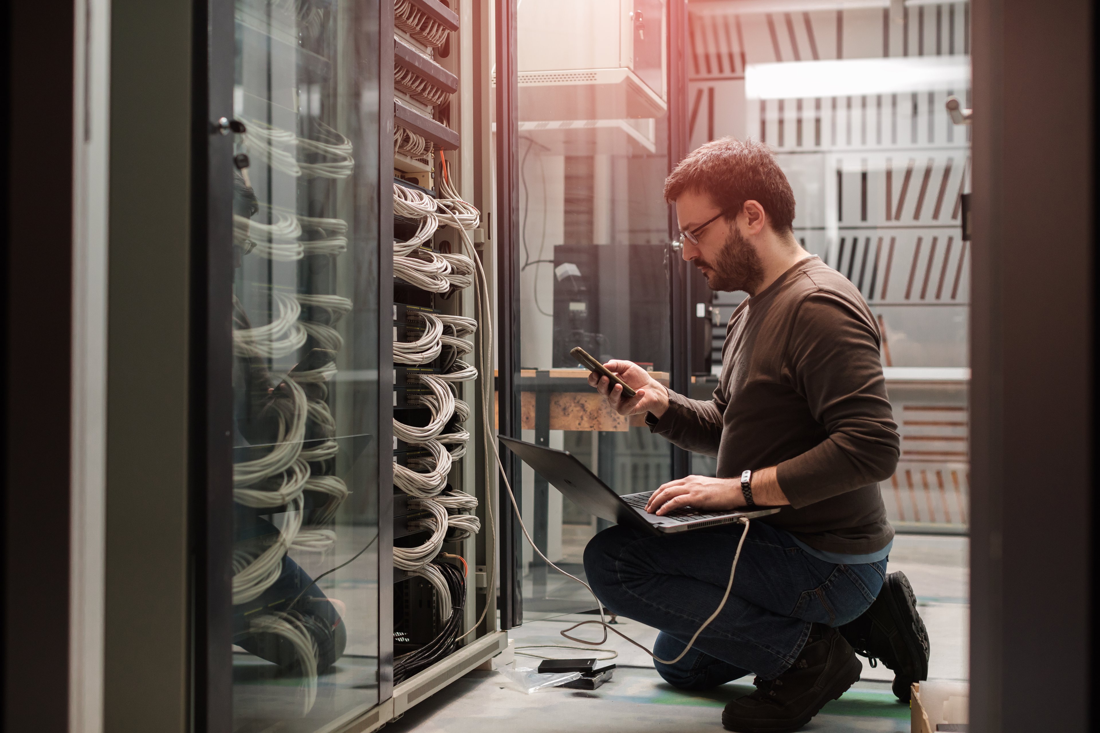 Man working on a server.
