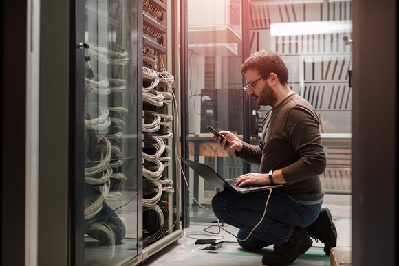 Man working on a server.